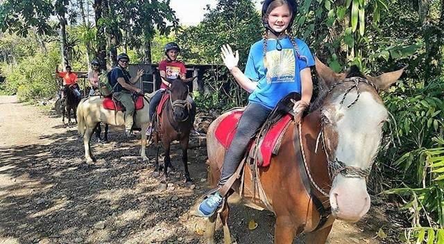 Riders exploring the tropical forest in Manuel Antonio on horseback