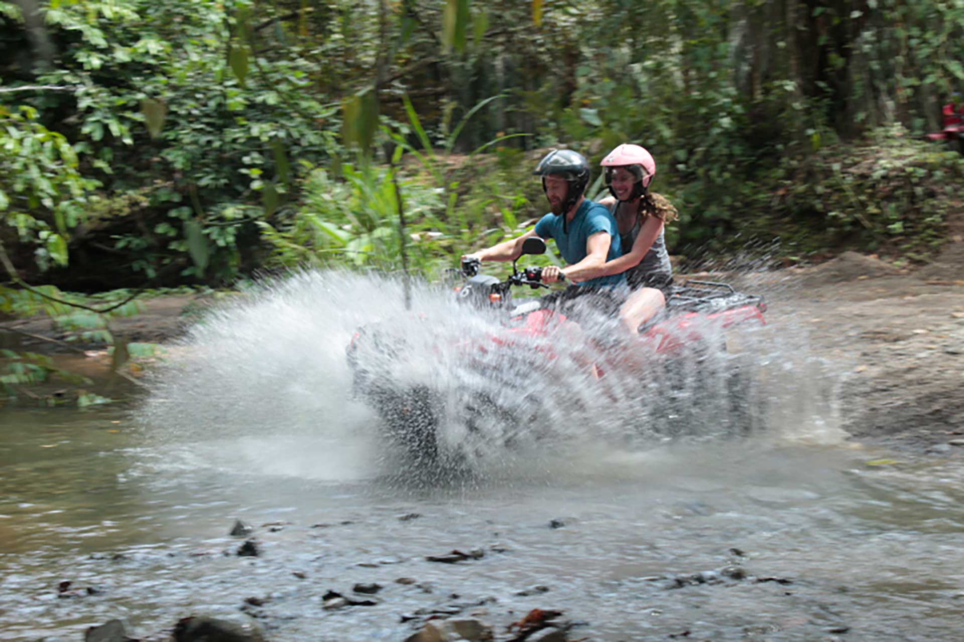 ATV riders exploring the beautiful countryside of Manuel Antonio