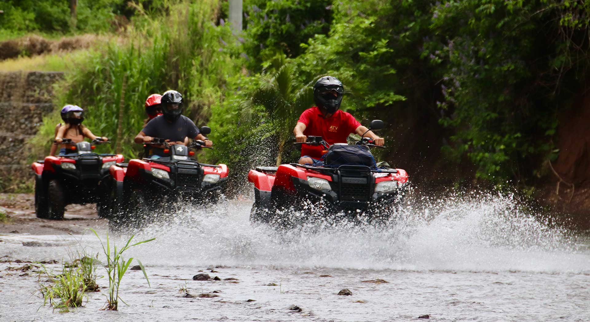 A group photo capturing memories of the Manuel Antonio ATV Tour